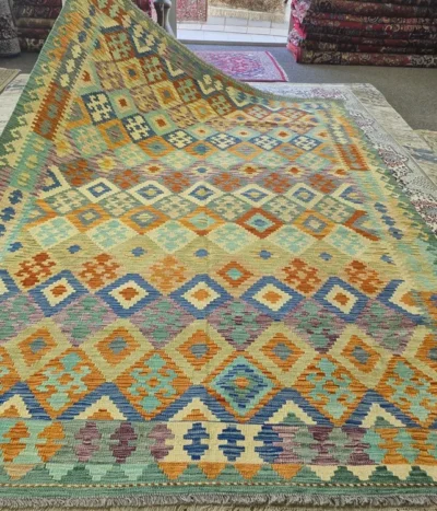 Flat-Weave Afghan Kilim, Size: 301 x 207 cm, Interlocking diamond medallions with a striking zigzag stepped border, golden mustard, terracotta orange, deep teal & bold royal blue accents 100% Hand-spun Wool on a Wool foundation.