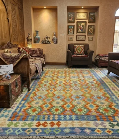Hand-Woven Afghan Kilim, Size: 298 x 216 cm, Traditional geometric diamond medallions, vibrant harmony of terracottas, warm oranges, soft greens, muted purples, and striking lapis blue accents on a classic cream ground, 100% Hand-spun Wool on a Wool foundation.