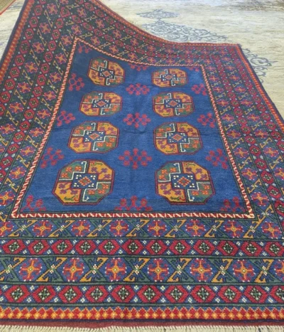 Authentic Handmade Bokhara featuring geometric Gül medallions, Size: 195 x 146 cm, Rich Royal Blue field, 100% Hand-Spun Wool on Cotton Warp.