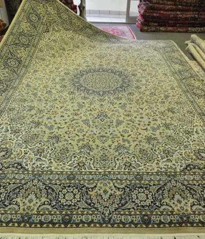 Persian Nain rug, Size: 400×300 cm, earthy tone colour, 400 knots per square, wool on cotton, R15 000 valuation certificate.