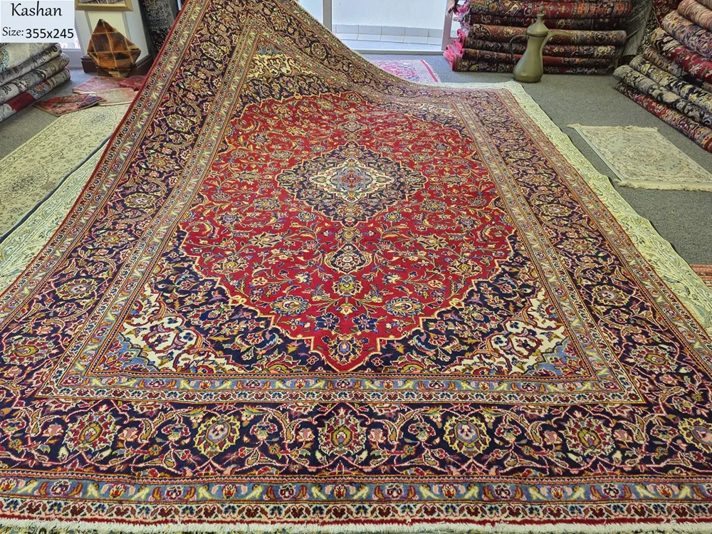 Traditional Kashan Persian Carpet, Size: 355 x 245 cm, rich crimson red, multi-layered diamond medallion scrolling vines & delicate blossoms, Fine wool on cotton foundation.