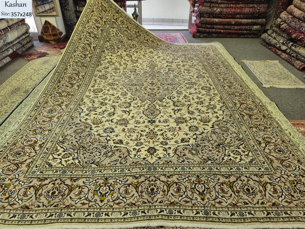Vintage Kashan Persian Carpet, Size: 357 x 248 cm, cream field, diamond-shaped medallion (Toranj) surrounded by detailed arabesques & floral motifs that radiate outwards, wool on cotton foundation.