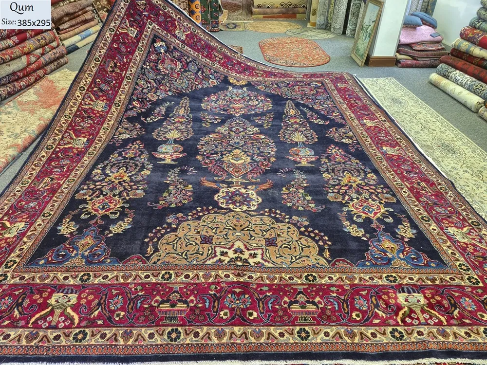 Hand-Knotted Persian Garden of Heaven Qum, Size: 385 x 295 cm, navy blue field features an intricate vase and tree-of-life motif, High-quality wool pile on cotton foundation.