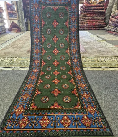 Handmade Bokhara Hallway runner, Size: 245 x 85 cm, deep forest green featuring traditional tribal patterns, High-quality wool.