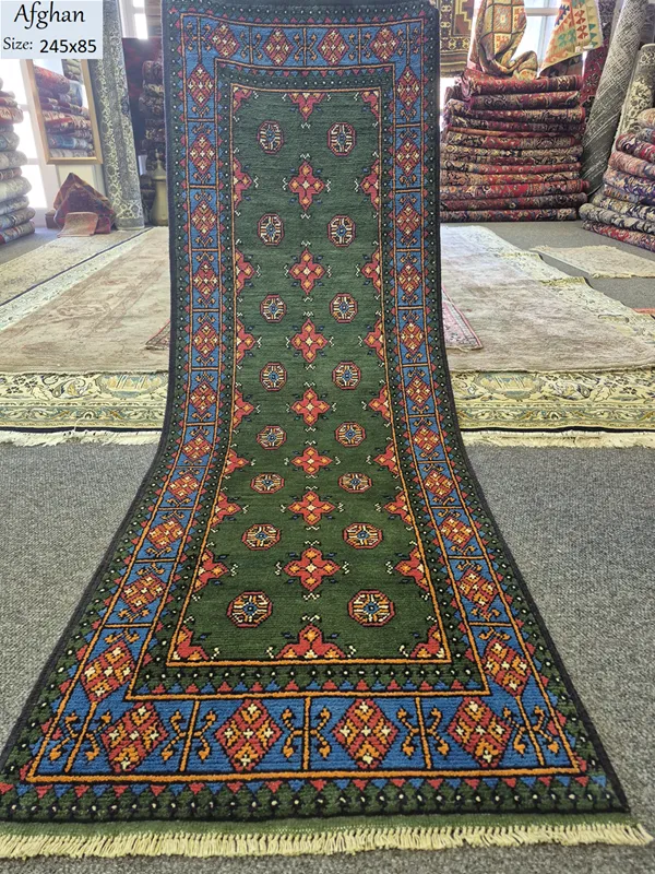 Handmade Bokhara Hallway runner, Size: 245 x 85 cm, deep forest green featuring traditional tribal patterns, High-quality wool.