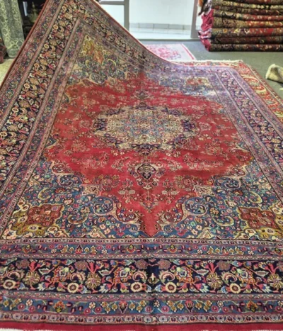 Vintage Hand-Knotted Mashad rug, Size: 340 x 248 cm, classic central medallion surrounded by intricate floral motifs, wool on cotton foundation.