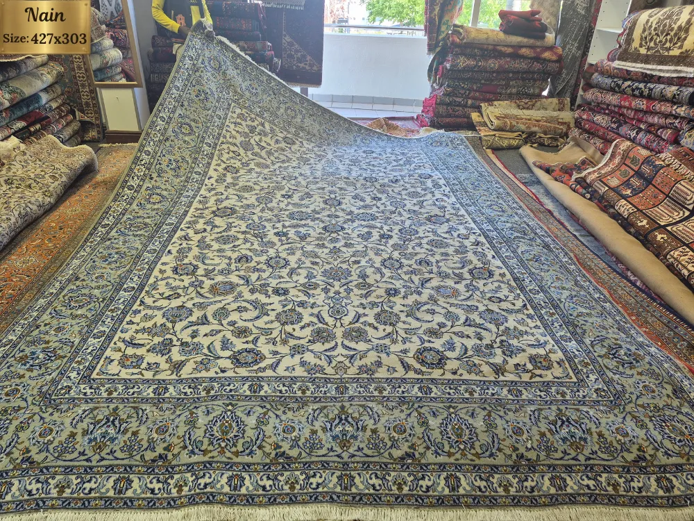 Vintage Sage Nain Persian Carpet, all-over floral and arabesque motif set against a soft sage and cream background, Size: 427 x 303 cm, Hand-knotted in soft low-to-medium wool pile.